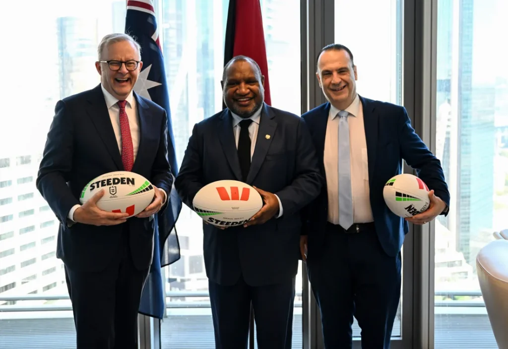 PNGRFL and partner representatives with match balls